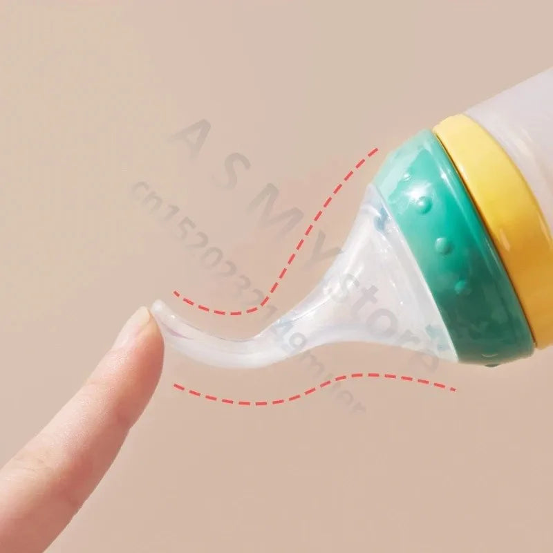 SqueezeFeeder Baby Silicone Feeding Bottle with Spoon