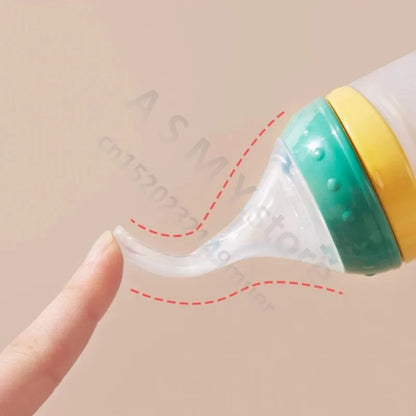 SqueezeFeeder Baby Silicone Feeding Bottle with Spoon