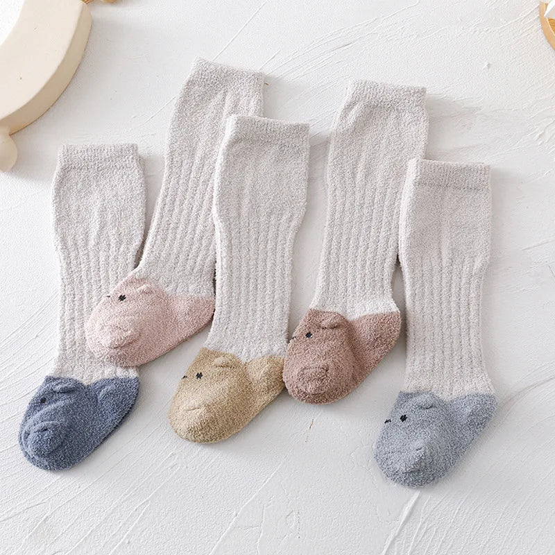 SnugKnee – Coral Fleece Knee-High Baby Socks 🧦❄️